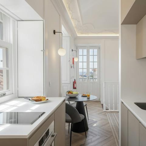 Fire up the coffee machine in the sleek, modern kitchen