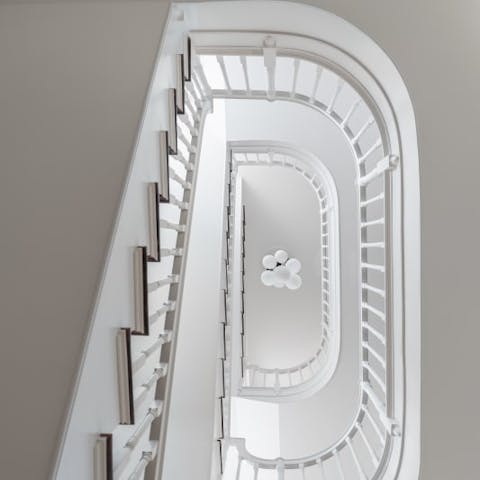 Marvel at the apartment building's oh-so-handsome historic features