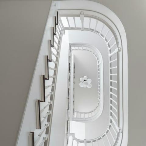 Marvel at the apartment building's oh-so-handsome historic features