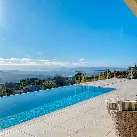 Step outside and feel on top of the world from the swimming pool