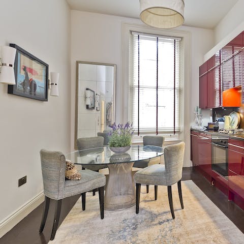 Gather around the sleek dining table for a candlelit home-cooked meal for two