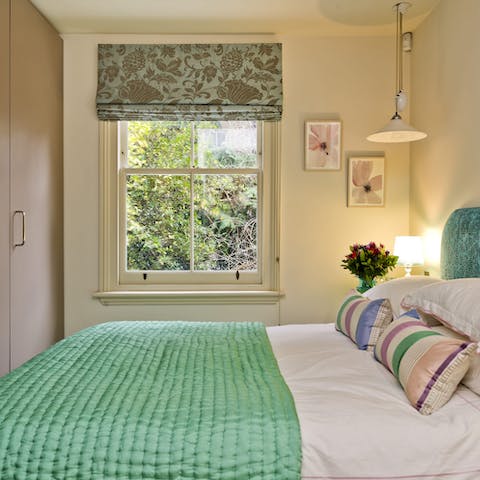 Wake up and open your blinds to start your day with a view of the flickering trees