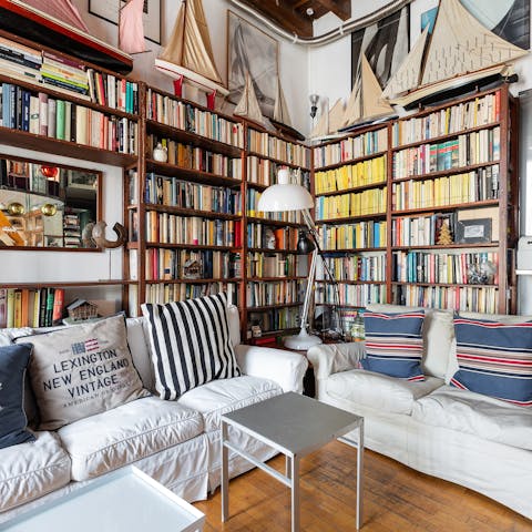Relax on the sofa with a book from your host's vast collection