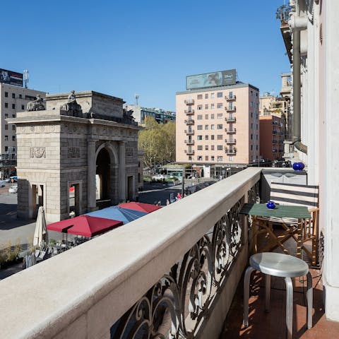 Sip an espresso on the private balcony overlooking Porta Garibaldi