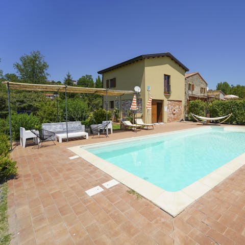 Doze in a hammock or dine alfresco – the garden is a lovely spot