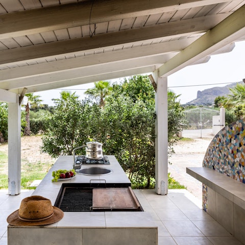 Prepare an alfresco feast in the outdoor kitchen