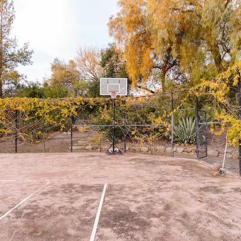 Uplift your stay with an energising game of tennis on the clay court