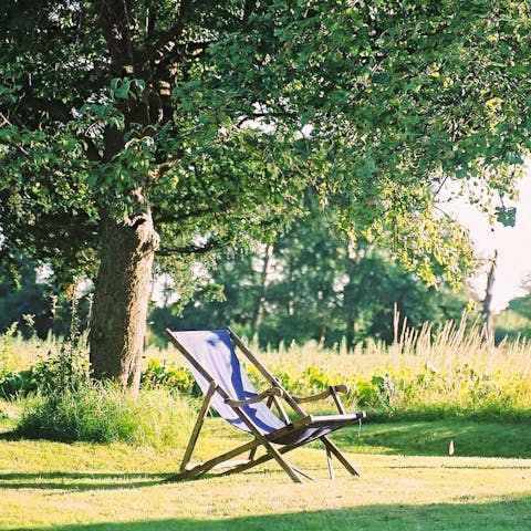 Wander through the gardens, snacking on fruit from the apple and pear trees