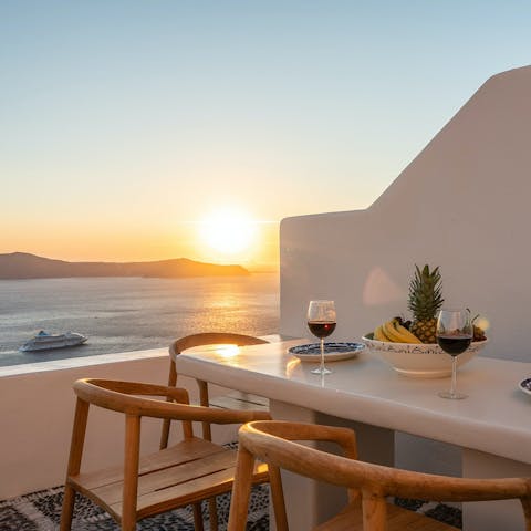 Enjoy a glass of wine and nibbles on your private balcony
