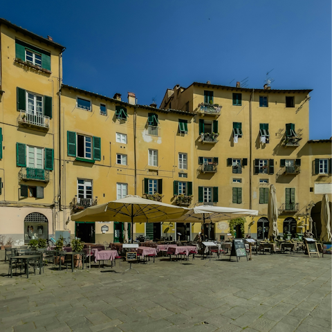 Have a bite to eat in Piazza dell'Anfiteatro – it's seven minutes away on foot