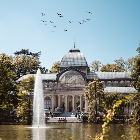 Enjoy refreshing afternoon strolls through nearby El Retiro Park