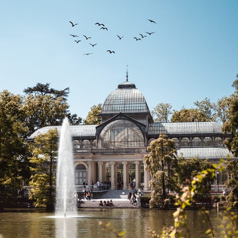 Enjoy refreshing afternoon strolls through nearby El Retiro Park