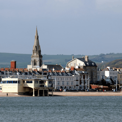 Drive to Weymouth beach for a day relaxing on the golden sand