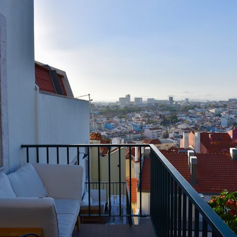 Watch the sun set over the city from the shared roof terrace