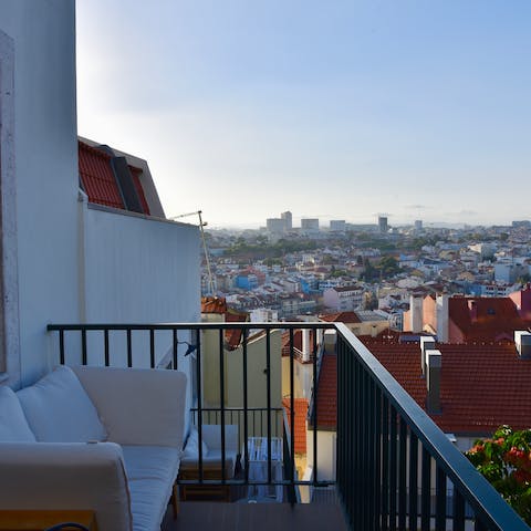 Watch the sun set over the city from the shared roof terrace