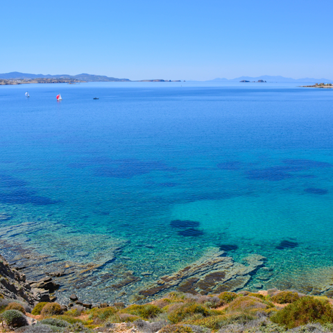 Swim in the clear sea at Paralia Lolantonis – it's a short drive away