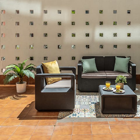 Relax on the outdoor lounge and soak up the sun