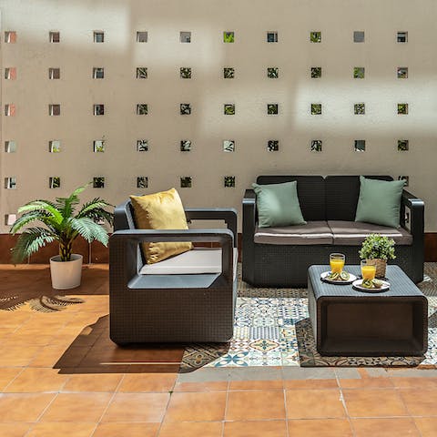 Relax on the outdoor lounge and soak up the sun