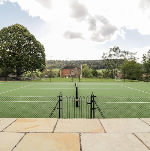 Play a game on the tennis court in the 3 acres of grounds