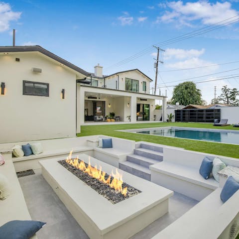 Unwind in the cosy firepit area