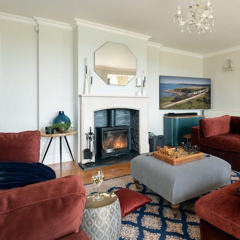 Light the log burner for cosy evenings in the stylish living room