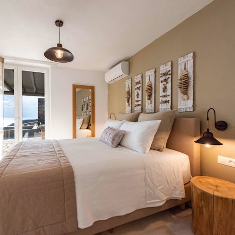 Wake up to sea views each morning from the stylish primary suite