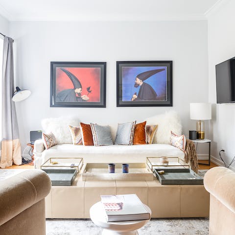 Admire the host's collection of striking artwork