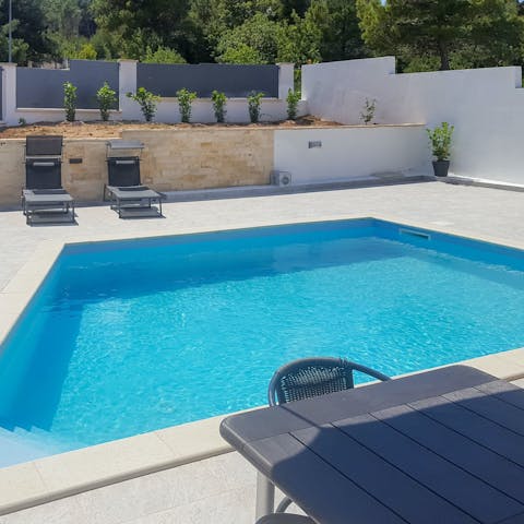 Take a refreshing dip in the private swimming pool