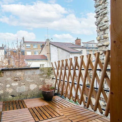 Enjoy your morning café au lait on the private balcony