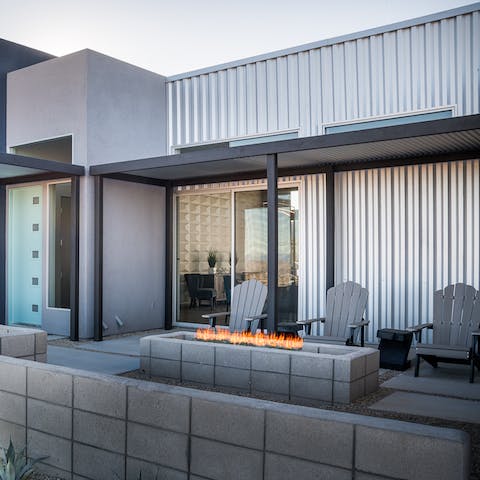Get cosy by the fire pit in the balmy desert evenings