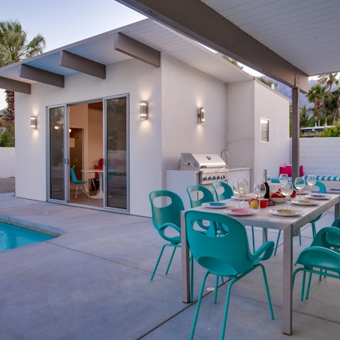 Dine on the patio against the mountains and ten-foot patio slider