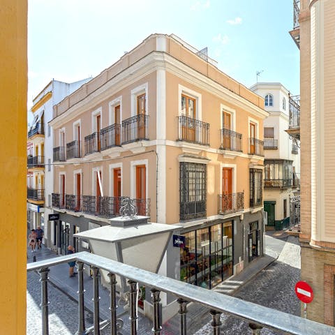 Perch by the Juliet balcony with an evening glass of Spanish wine