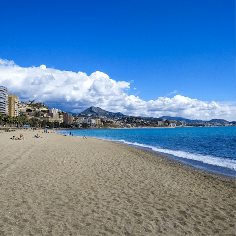 Catch some rays at Malagueta Beach, a short walk from home