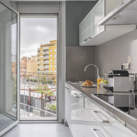 Cook up a feast at home while enjoying the breeze from the kitchen's terrace