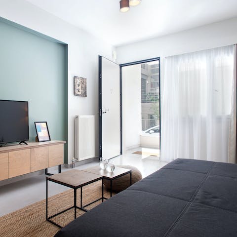 Stretch out on the vast sofa after a day exploring the city