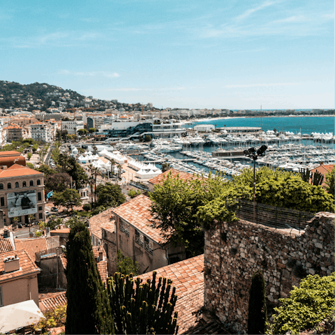 Sit in a quaint coffee shop then wander through Cannes bay