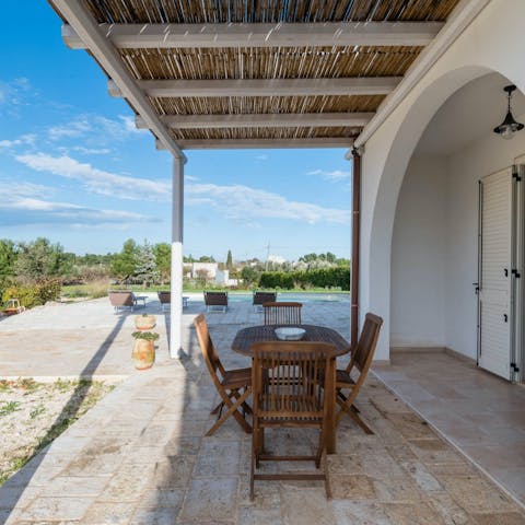 Light the barbecue for an alfresco meal on the terrace