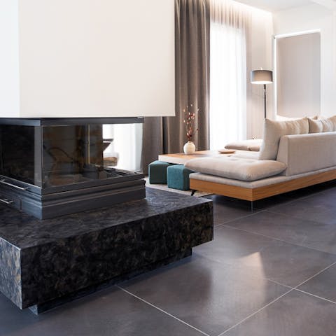 The modern fireplace makes the home cosy and chic