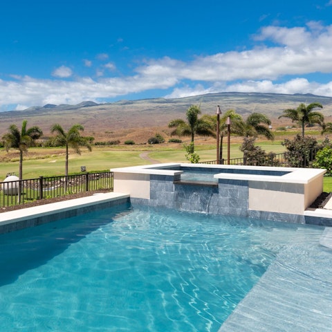 Enjoy scenic views from the pool and Jacuzzi