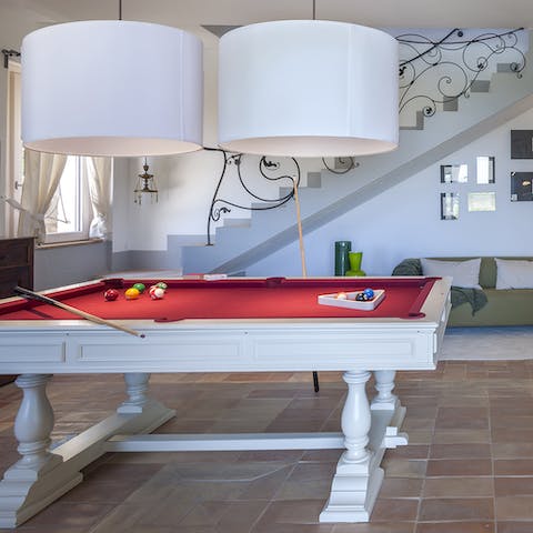 Take solace from the mid-day sun and challenge your group to a game of pool – loser makes the cocktails