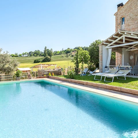 Spend blissful days relaxing by the pool, lost in a good book, and occasionally taking a dip to cool off