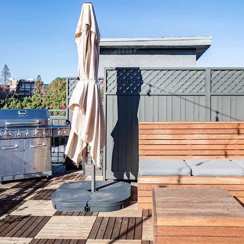 Grill out and enjoy a drink on the rooftop deck