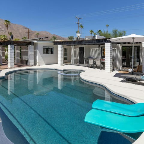 Cool off from the Palm Springs sun in the private pool