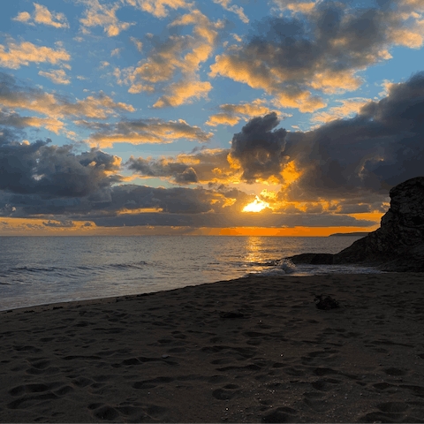 Walk to the sandy beach in a matter of minutes from your beachside home in pretty Portwrinkle