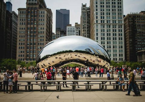 Marvel at the Cloud Gate sculpture in Millennium Park, a nineteen-minute drive