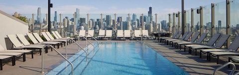 Head to the communal rooftop for a swim beneath city skies