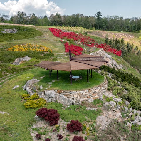 Take a picnic to the wooden gazebo,  surrounded by dramatic landscape