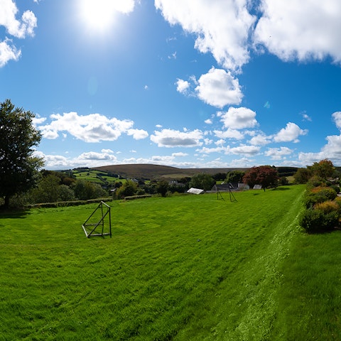 Kick around a football in the luscious garden