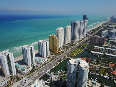Relax on Sunny Isles Beach's broad golden sands – a short drive