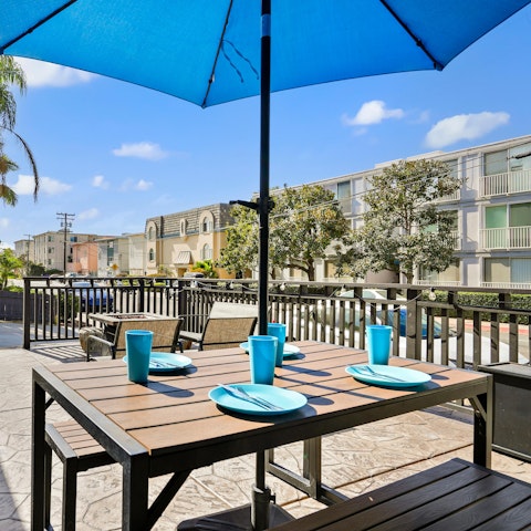 Tuck into freshly grilled food on the sunny terrace